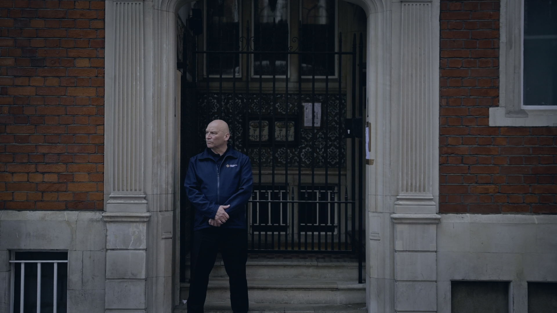 Security officer on duty at a London building entrance