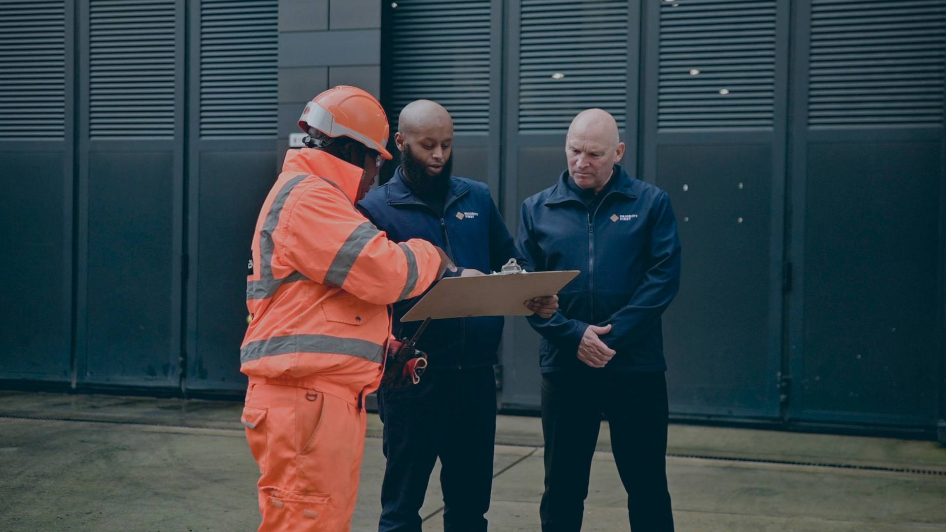 Two officers reviewing a site briefing together